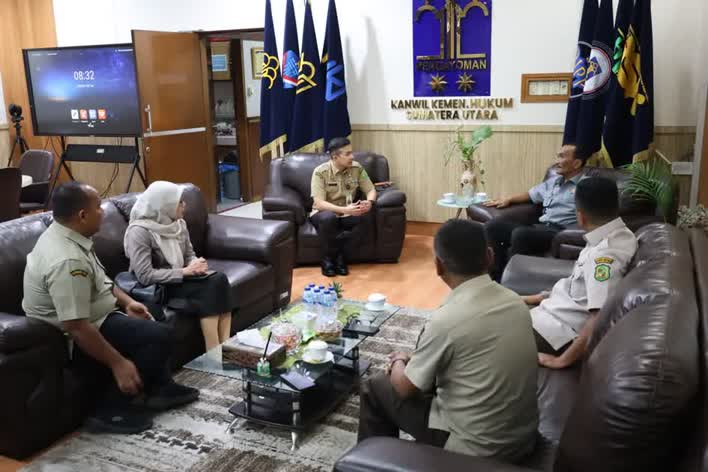 Kepala Bapenda Kota Medan Jalin Sinergi Dengan Kanwil Kemenkum Sumut Untuk Penguatan Tata Kelola Perpajakan